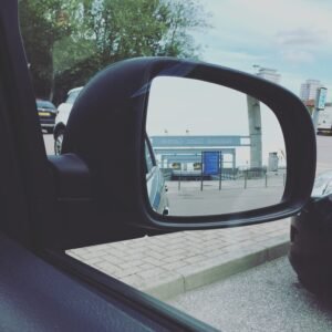 Photo © Hello Little Lady - view of Sunderland National Glass Centre through car mirror.