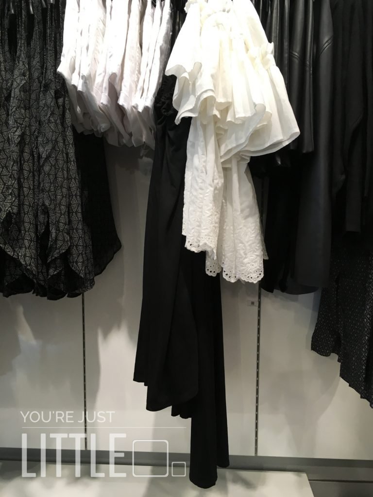 You're Just Little - clothes shopping, perspective of a rail of clothes that are above my head level